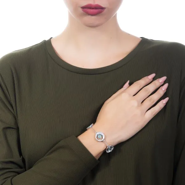Bracciale con elementi lunari di zirconi e cristallo verde acqua    